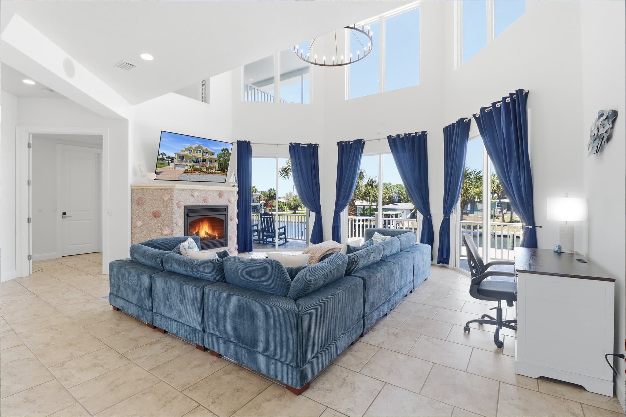 Main living room at Bayshore Getaway — open concept Crystal River 5BR vacation rental with vaulted ceilings